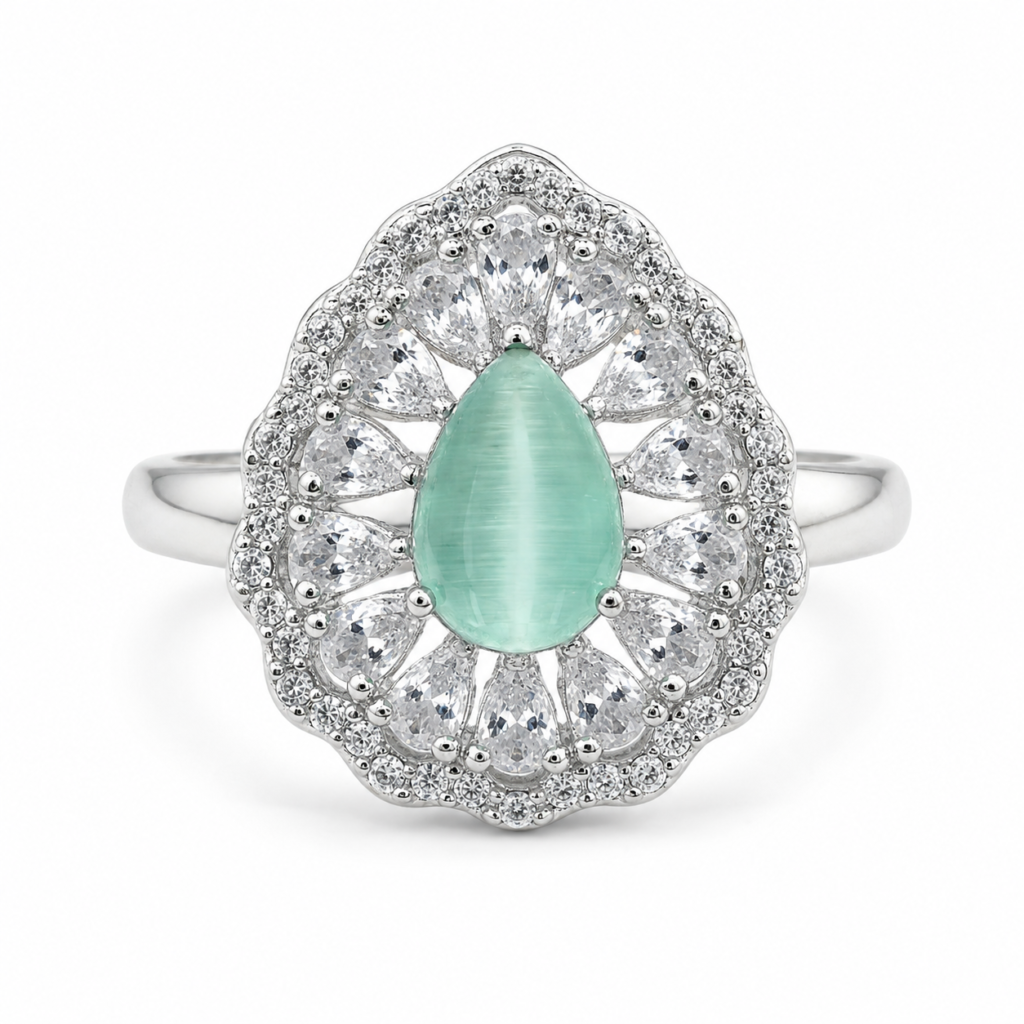 drop shape pastel green stone in semi cocktail ring