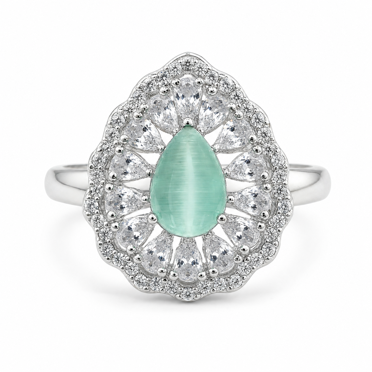 drop shape pastel green stone in semi cocktail ring